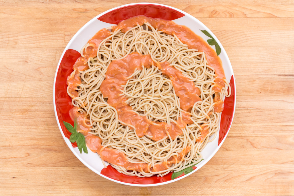 #9 Pour the tomato dressing on noodles around rim of the bowl.