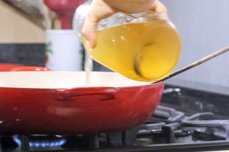 13 Slowly pour in the vegetable stock